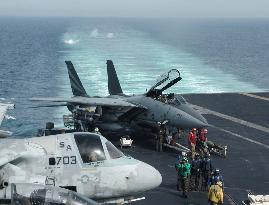 U.S. Navy allows media aboard Kitty Hawk to observe drills